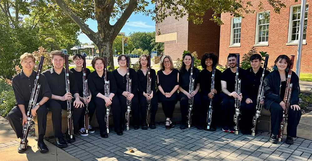 members of the bassoon ensemble with their instruments