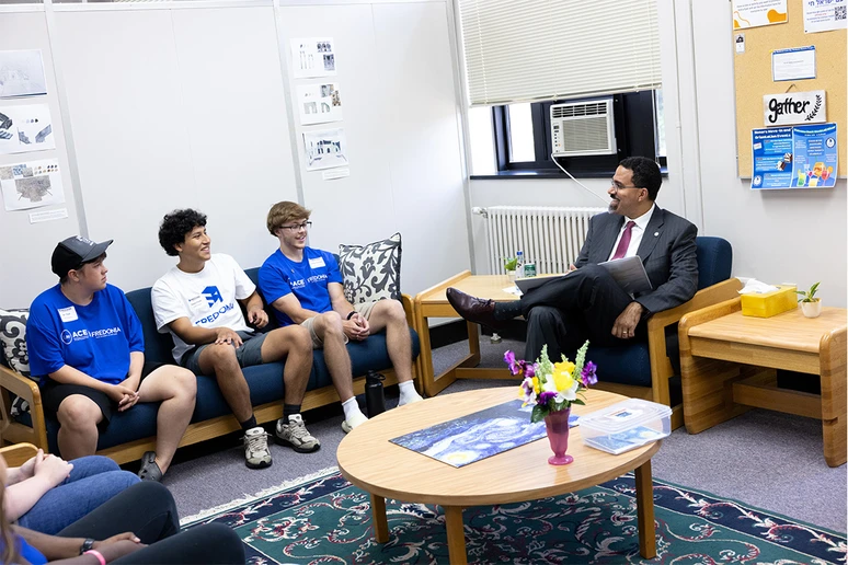Chancellor King talking with current students