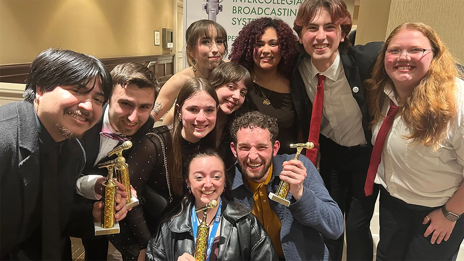 group of students attending conference with their awards