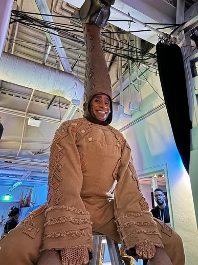 Gabriel Croom in giraffe costume in "The Lion King"