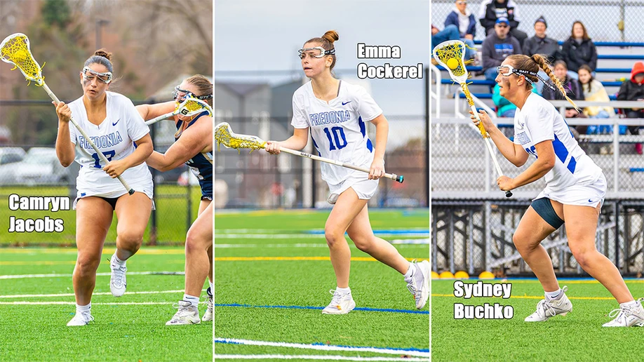three lacrosse players in action