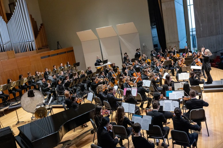 orchestra playing in King Concert Hall