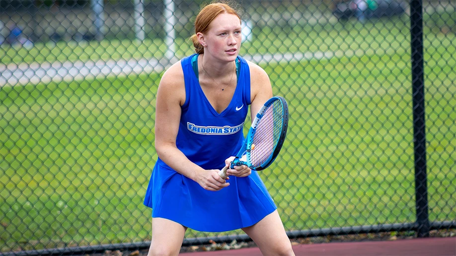 Sophia Olson playing tennis