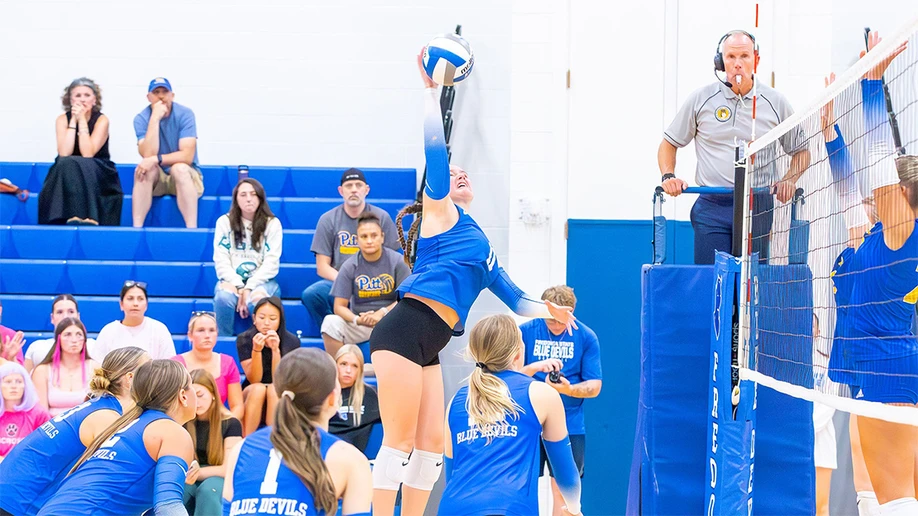 Maeve Musilak plays with confidence as her teammates give her support.