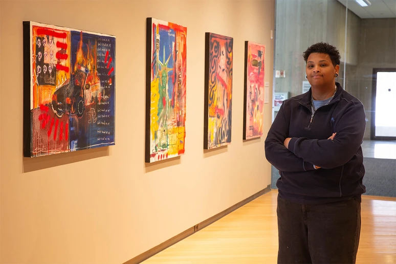 AJ Hanrahan, with award-winning painting series “If Not Now, Then When??