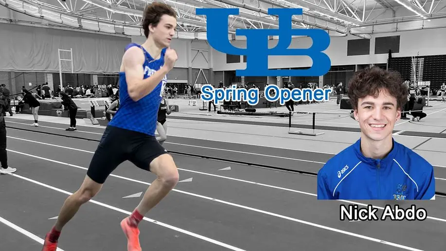 student running on track