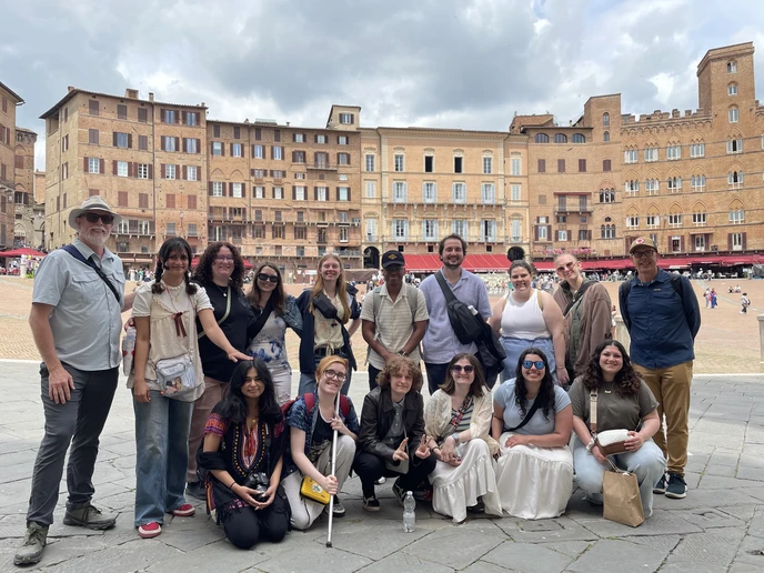 Gathering in front of Piazza del Campo in Siena, Italy, are (front row, from left): Nia Anand, Caitlyn Sterner, Eli Conrad, Paige Smith, Jean Castro and Vanessa Lotito; (back row): Associate Professor Peter Tucker, Maya Kulick, Andrea Conner, Brittany Howe, Kady Osborne, Jaivon Eggleston, Noah Freeland, Sarah Crouse, Olivia Schindler and Professor David Kinkela.