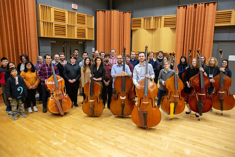 Students and attendees, along with faculty, gather for a group photo of Bass Fest held at SUNY Fredonia.