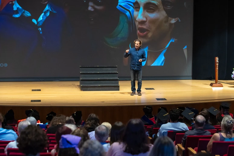 Chris Bashinelli on stage at King Concert Hall