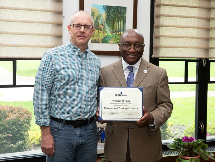 SUNY Distinguished Teaching Professor William Brown (left) with President Stephen H. Kolison Jr.