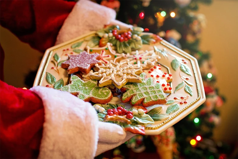 Santa offering cookies