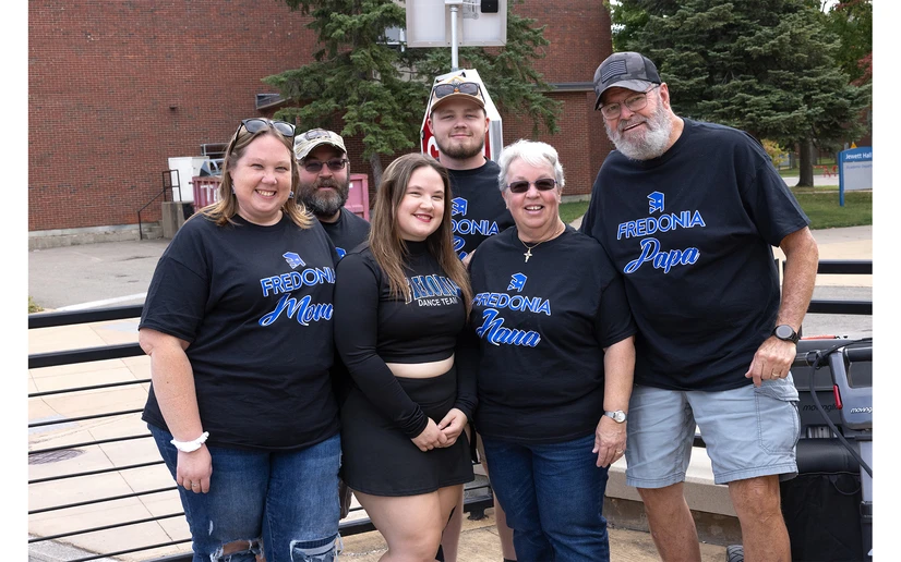 group of family members in matching t-shirts
