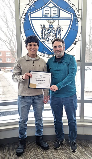 Cesar Firmat (left), with Mark Mackey, of Information Technology Services.