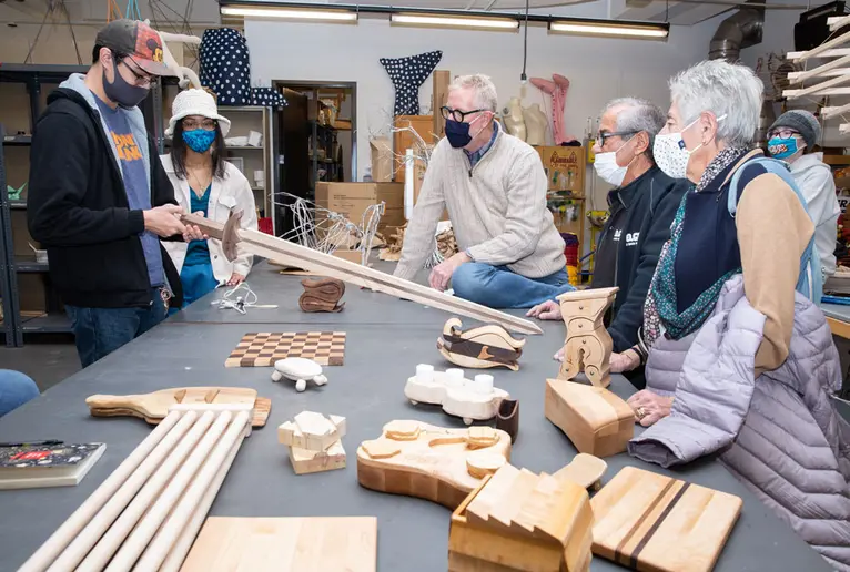 students display projects for guest furniture maker