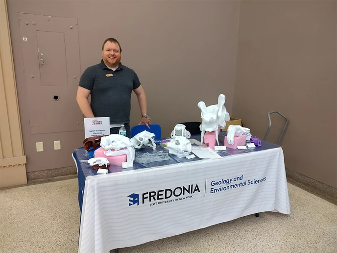 Dr. Thomas Hegna, at the Geology and Environmental Sciences display at the Buffalo Museum of Science’s Science After Hours: Stones & Bones event.