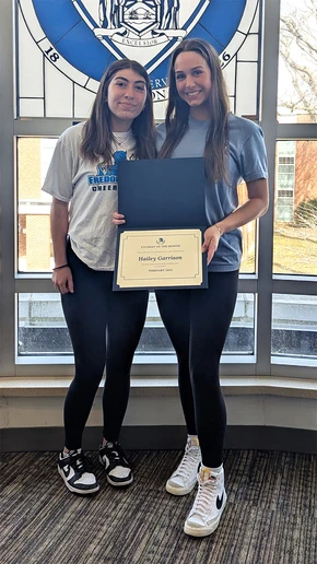 Hailey Garrison (right) with teammate Alexia Bryant.