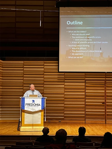 Dr. Thomas Hegna, presenting the Robert W. Kasling lecture in the Juliet J. Rosch Recital Hall. Photo by Dr. Syed Haider