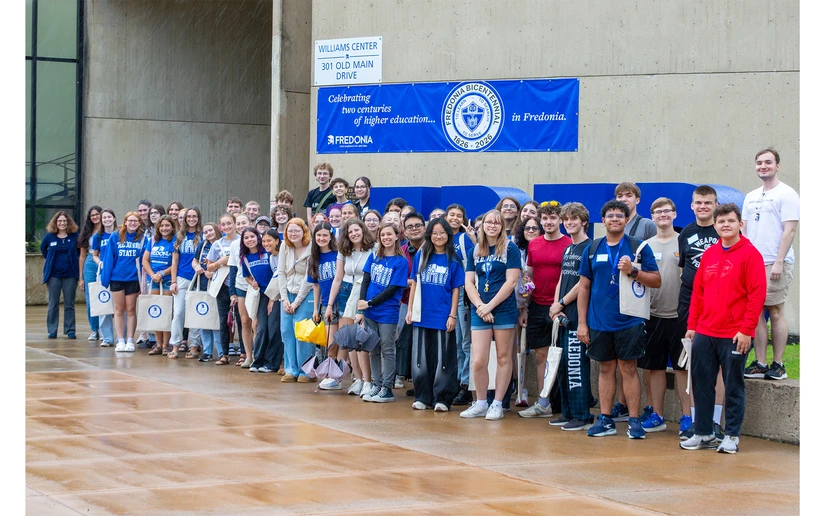 Honors program class members standing in front of the Williams Center