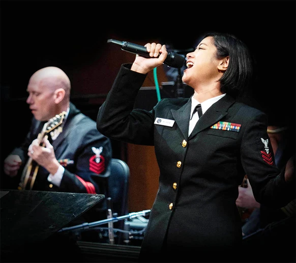 Kristine Hsia singing with band