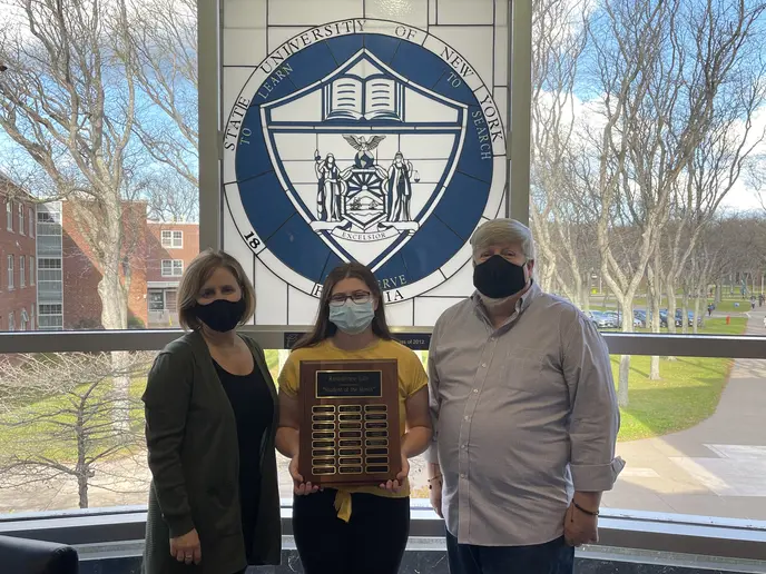 Student of the Month with Residence Life staff