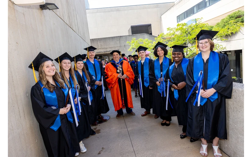 Mace bearer and SUNY Distinguished Teaching Professor Michael Jabot with Honors program students