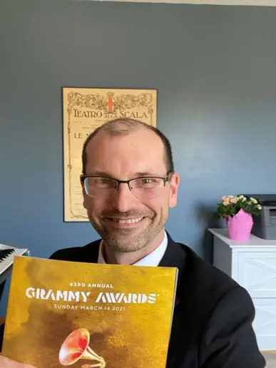 Dr. Adam Luebke with GRAMMY program