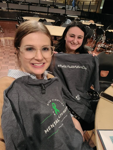 Brianna Postle (left) and Abigail Tartaro, with t-shirts received at the Mental Health Matters Day held in Albany, NY.