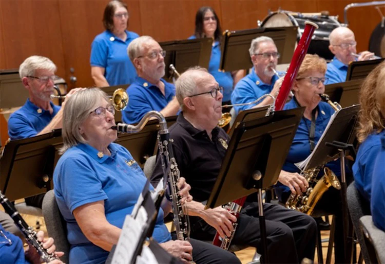 New Horizons Band members performing on stage