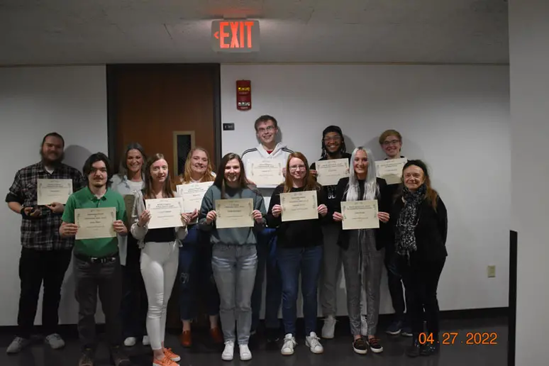 award recipients gather with faculty