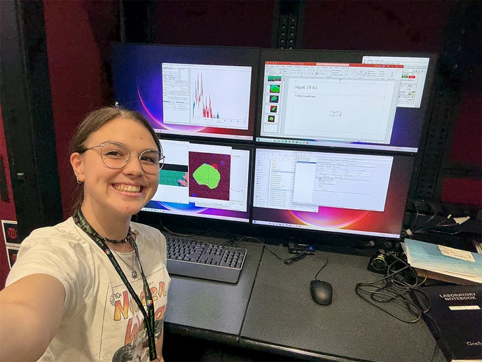 Isabelle “Belle” Price, in front of computers used to analyze x-ray absorption near edge structure (XANES) data.