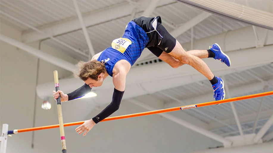 Noah Snyder pole vaulting
