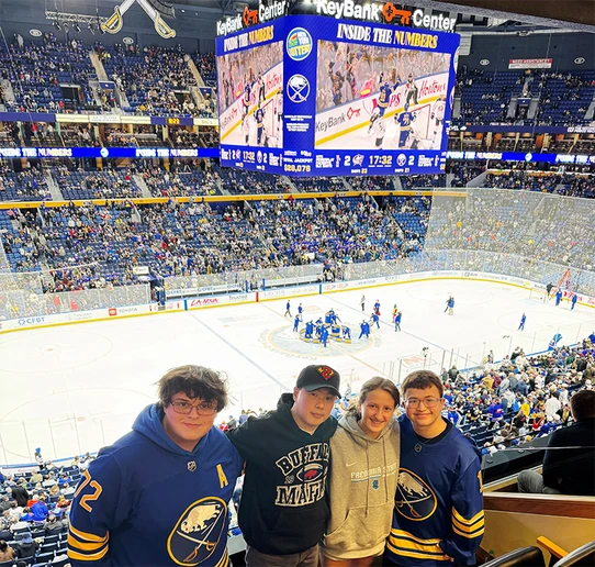 The SUNY Fredonia contingent (from left): Jeffry Sayers, Dr. Sungick Min, Piper Evangelist and Christopher Mozzillo at KeyBank Center in Buffalo, NY.