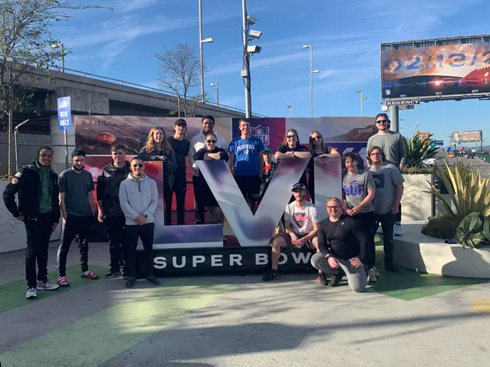 group of students arriving for Super Bowl