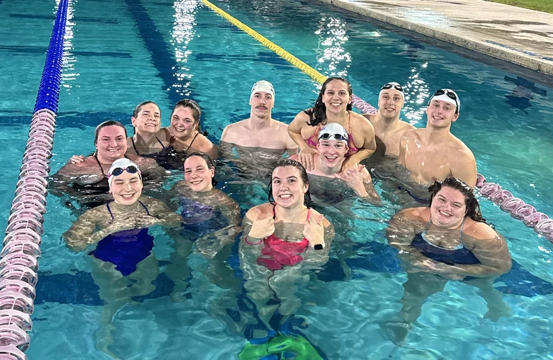 Scholar All-America Team members include (front row, from left): Rachel Phillips, Lily Phillips, Megan Orrange and Alexandria Visconte; (back row): Michelina Bautz, Kaitlyn Burns, Alexandra Mecca, Noah Wisniewski, Aaron Burkett, with Cleo McDermott on his shoulders, Alexander Wright and Matt Dunn.  
