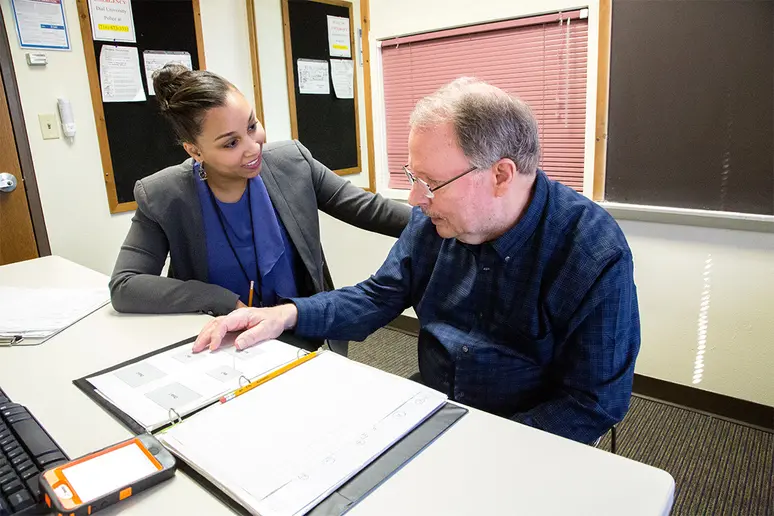 client in clinic with graduate student