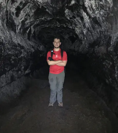 geology student in a cave