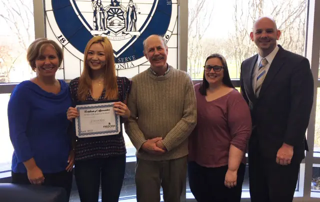 Heather Han (second from left), with (from left): Kathy Forster, director of Residence Life; Dr. Jack Croxton; Alicia Wroblewski