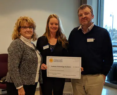 Ann Eckman of the Northern Chautauqua Community Foundation (left), Lauri Gawronski and Incubator Director Chuck Cornell