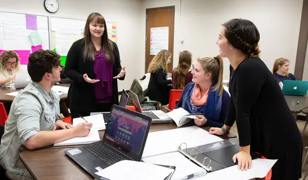 Students enrolled in the graduate-level course Foundations of Literacy in the College of Education at Fredonia receive classroom