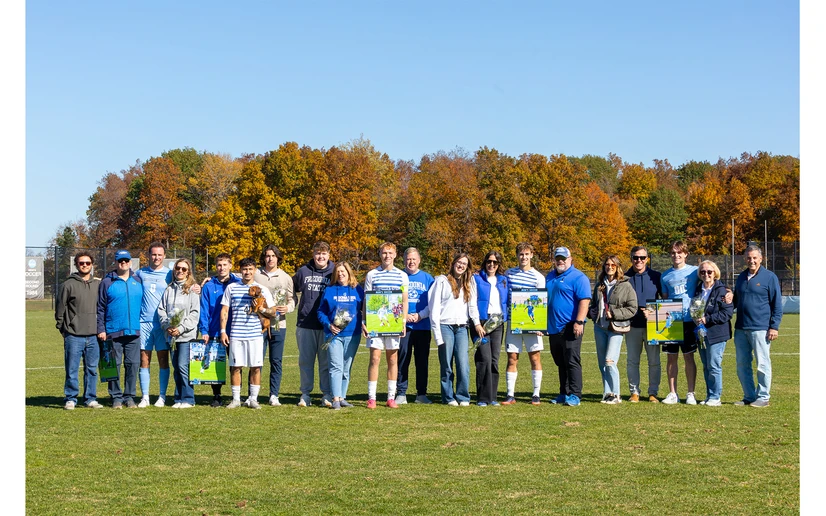 seniors on the soccer team and their families by Travis Bernhard