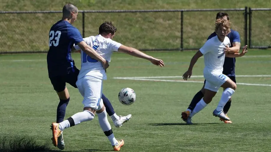 men playing soccer
