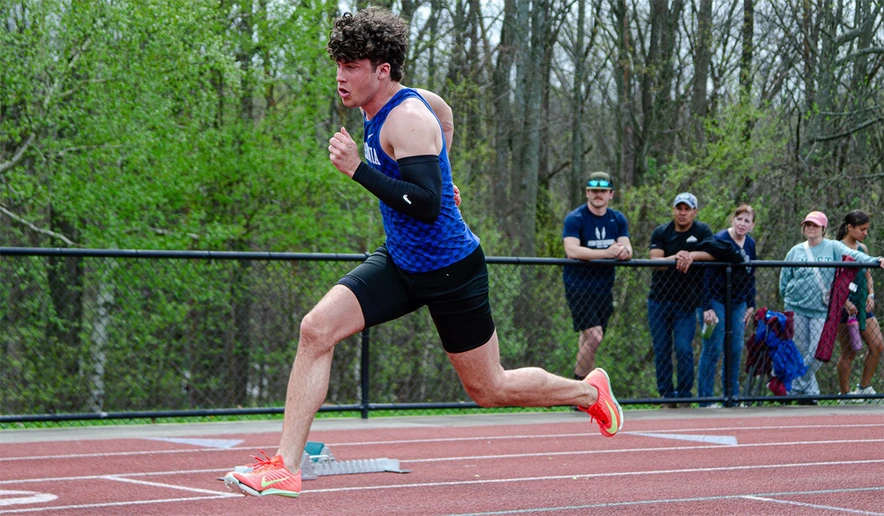 man running on a track