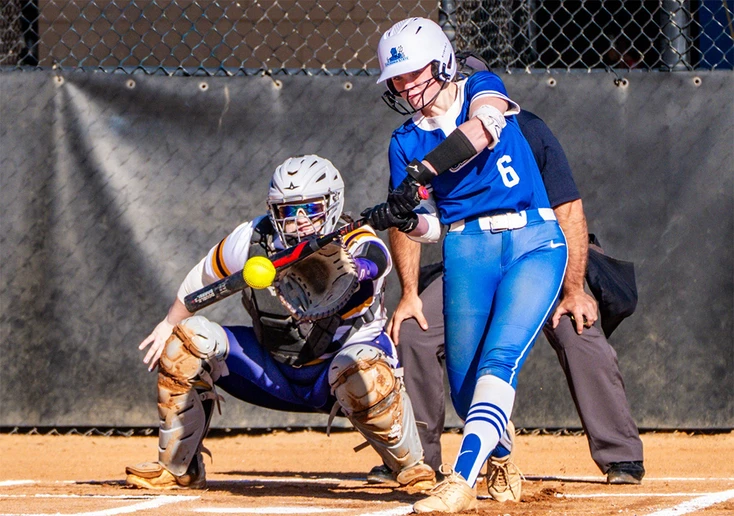softball player Maddy DeVore hitting 