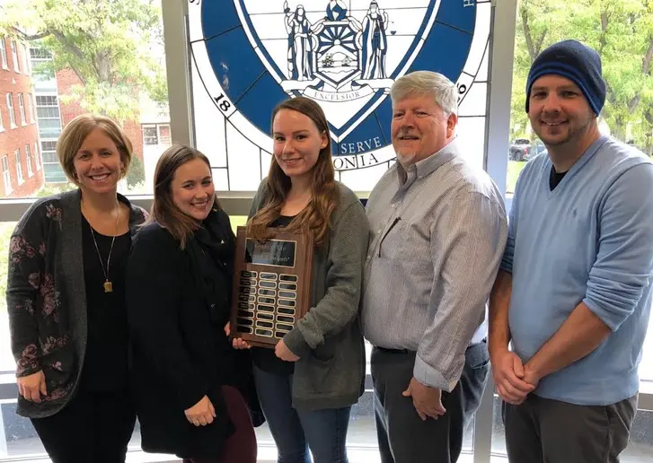 On hand for the awards presentation were (left to right) Director of Residence Life Kathy Forster, Alicia Wroblewski, Rachel Cla