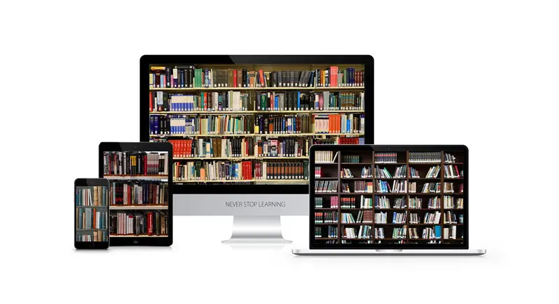 computer screen and books