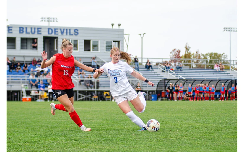 soccer players in action on the field