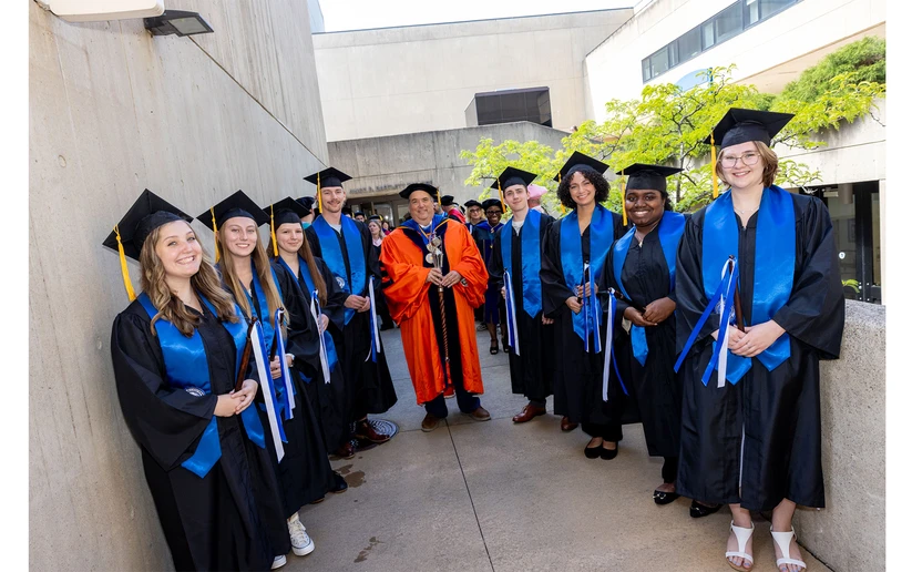 Mace bearer and SUNY Distinguished Teaching Professor Michael Jabot with Honors program students