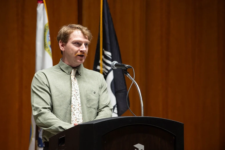 Matthew Adams, a senior Computer Science major, delivers the student address at the Veterans Remembrance Ceremony.