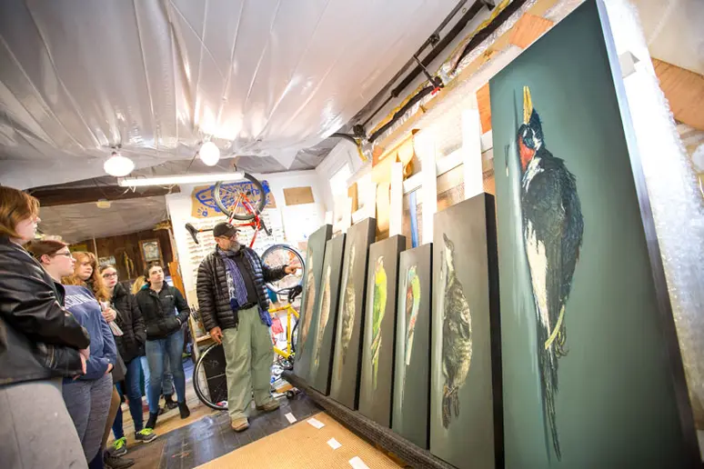 SUNY Distinguished Professor Alberto Rey with students in his home studio