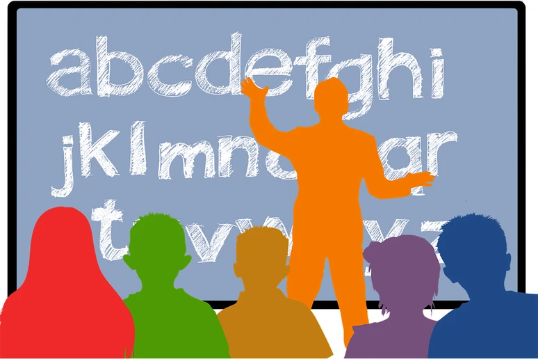 silhouettes of people and letters on a board